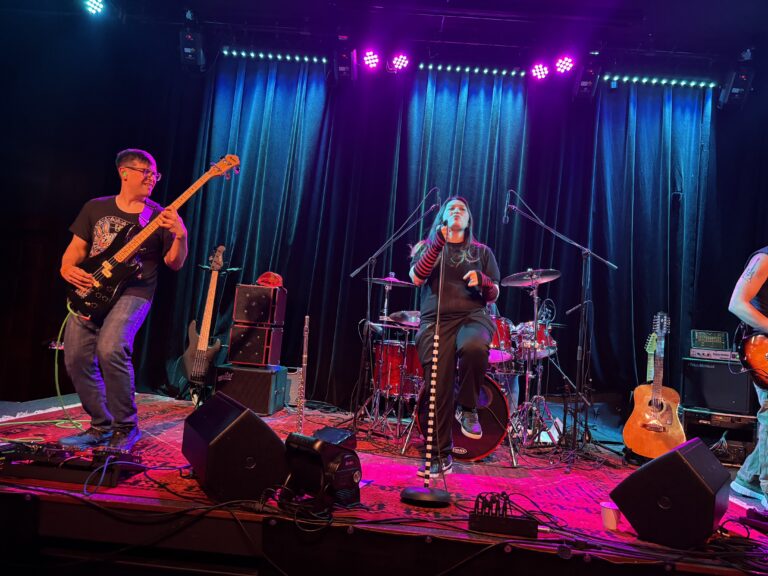 Female fronted Red Hot Chili Peppers tribute band Breaking The Girl performing live on stage in Chicago